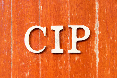 国际贸易术语解释通则旧红色木板本底的字母缩写CIP简化交通和支付保背景