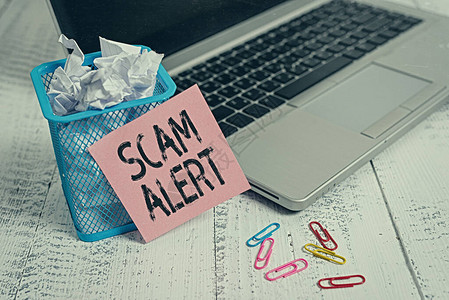 概念手写显示Scam警报概念意指警告某人密谋或欺诈图片