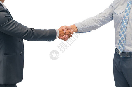 两位同事之间商务握手的特写图片