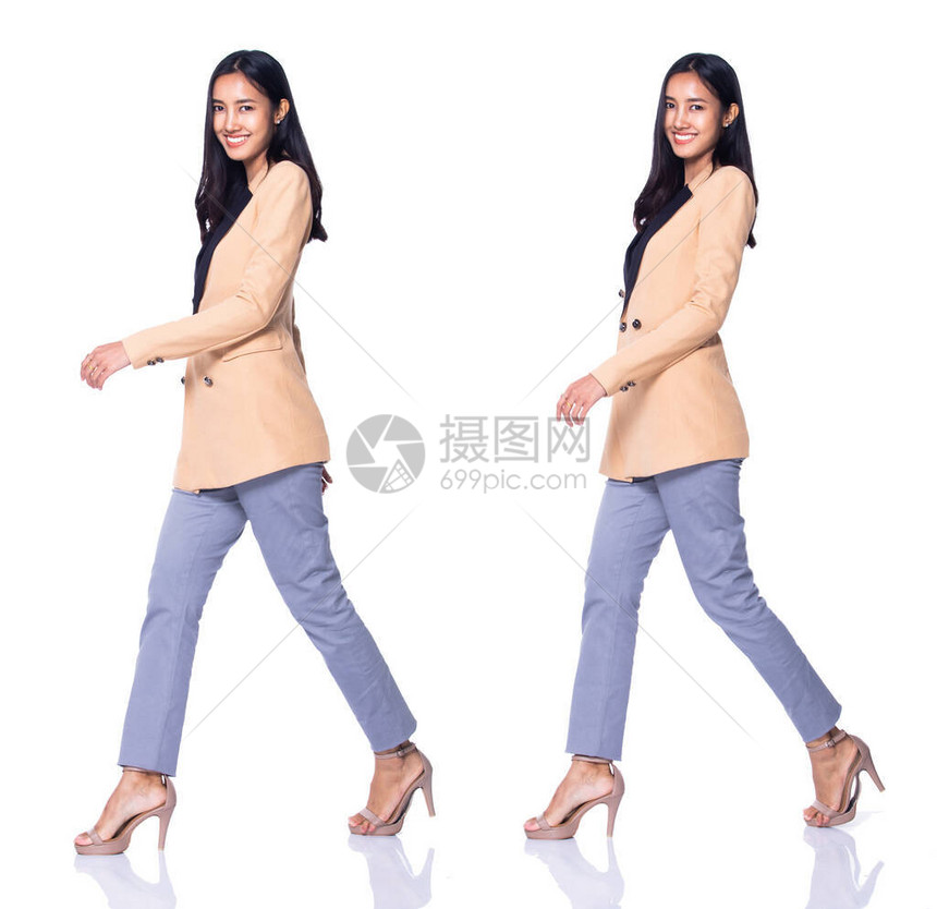 全长SnapFigure20多岁30多岁亚洲女商人站立在奶油正式适当的西装裤和高跟鞋图片