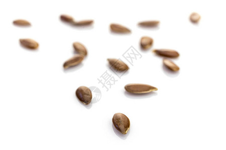 棕色亚麻籽背景堆食物亚麻籽或亚麻籽隔离在白色健康饮食节食和解毒概念图片