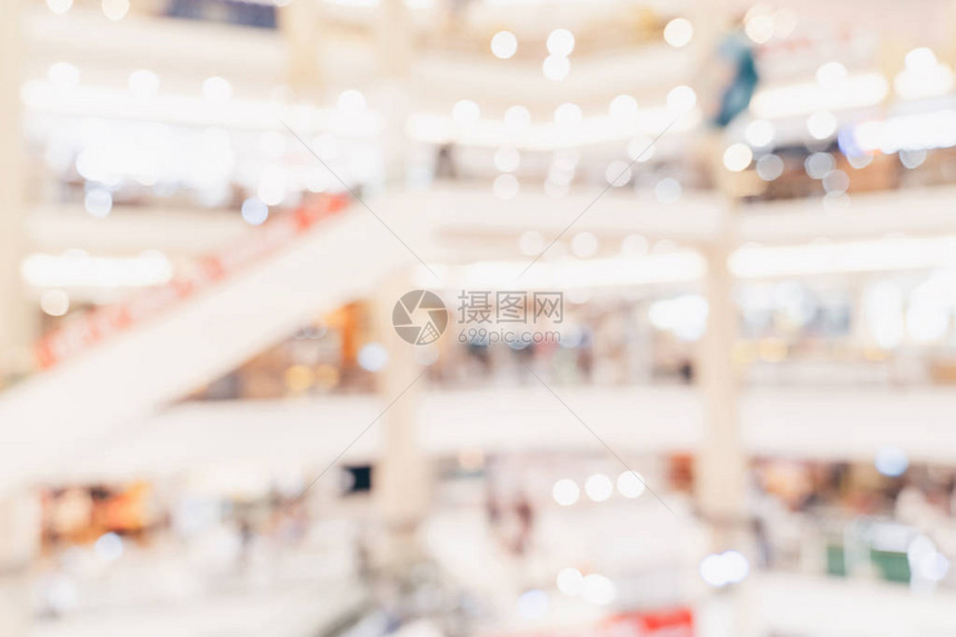 抽象模糊背景人群在购物中心的背图片
