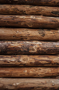 木材原木堆积背景的图片