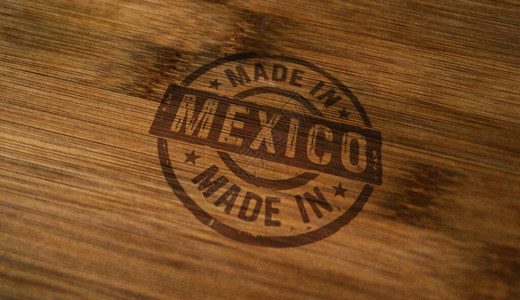 墨西哥制造的印章在木盒上工厂制造和背景图片