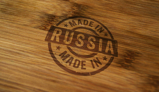 在俄罗斯制造印在木箱上的印章工厂制造国和生产国的概背景图片