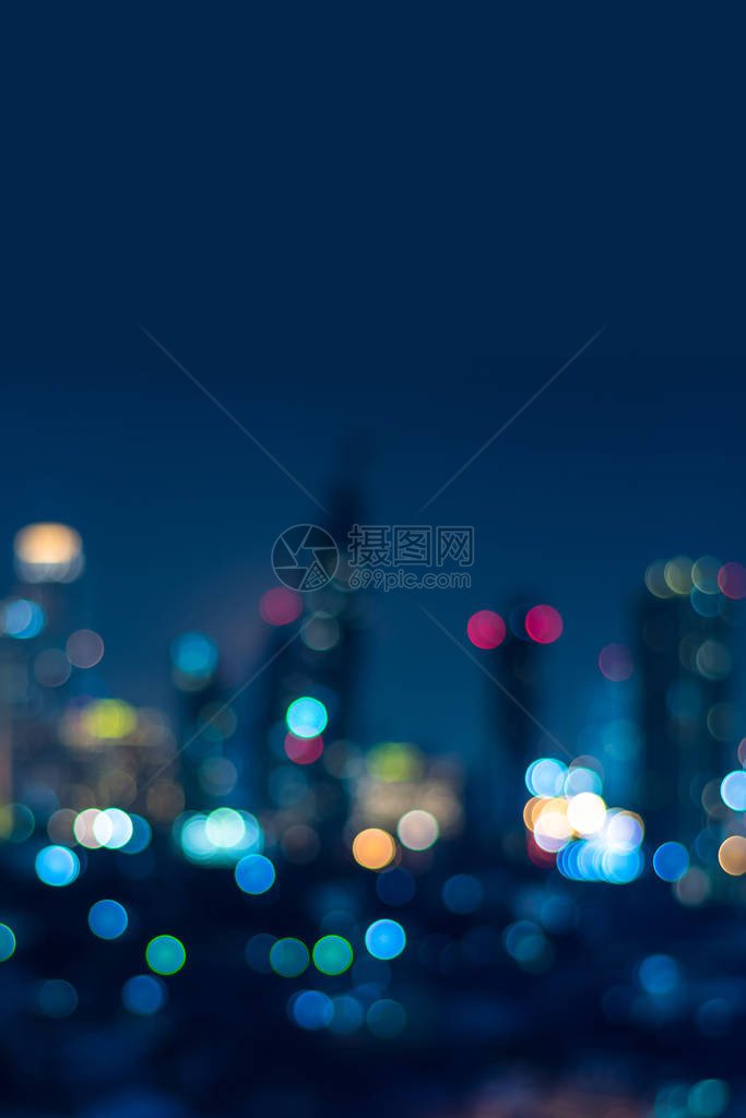 黄昏时模糊的散景城市景观的垂直城市背景屋顶ob大楼的鸟瞰角度市中心的散焦城市网络在线图形设计或图片