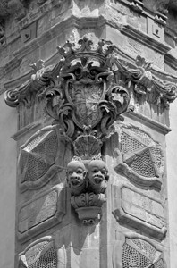 带有装饰雕像的巴洛克式贝内文塔诺宫门面背景图片
