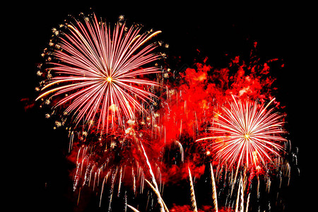 夜间彩色烟花为庆祝周年纪念活动展示背景的色背景图片