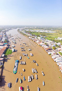 半价可以吗日出时的CaiRang漂浮市场在CanTho河湄公河三角洲地区南越旅游目的地销售批发水果背景