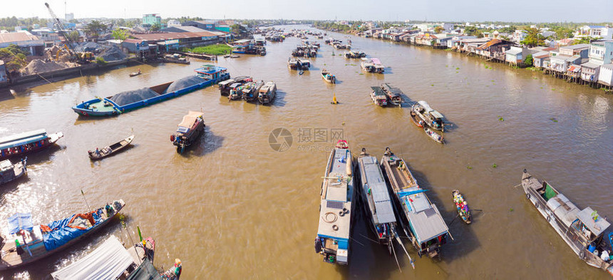 日出时的CaiRang漂浮市场在CanTho河湄公河三角洲地区南越旅游目的地销售批发水果图片