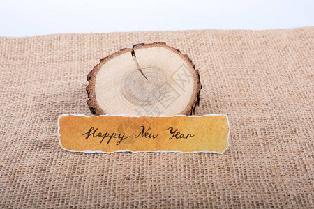 新年快乐写撕纸和锯木图片