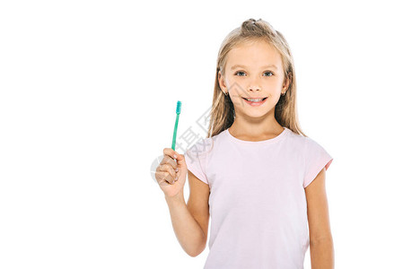 快乐的孩子拿着牙刷图片
