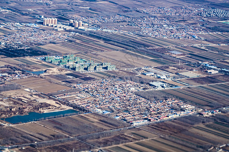 北京在从飞机上可见的住宅区背景图片