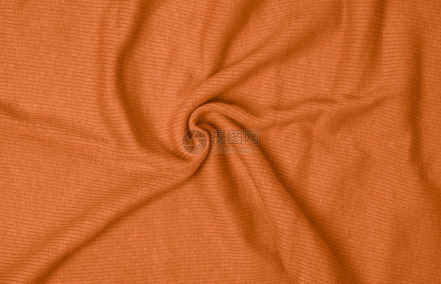 橙色织物纹理背景皱巴的织物背景图片