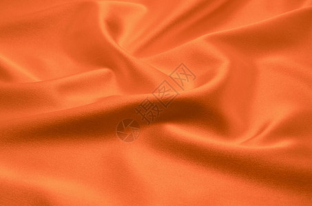橙色缎面背景纹理图片