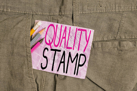 显示质量邮票的概念手写概念意义批准印章良好印象合格通过检验书写设备和裤袋图片