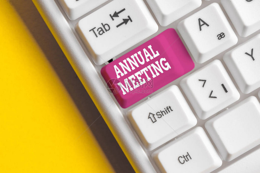 概念手写显示年会概念意指组织普通会员年度会议白色pc键盘图片