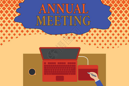 显示年会的书写笔记组织普通会员年度会议的经营理念上视笔记本电脑木桌工人绘图平板背景图片