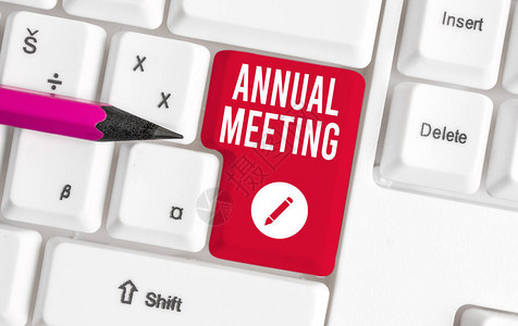 显示年会的书写笔记组织普通会员年度会议的商业概念白色pc键盘图片