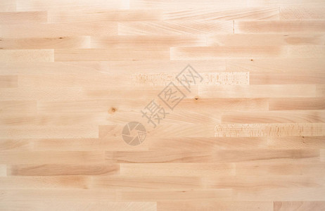 现代未完成木材案桌背背景图片