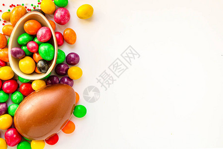 巧克力蛋和糖果Easter装饰菜单概念背景顶视图图片