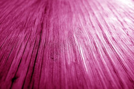 粉色语调模糊效果的木板纹理图片
