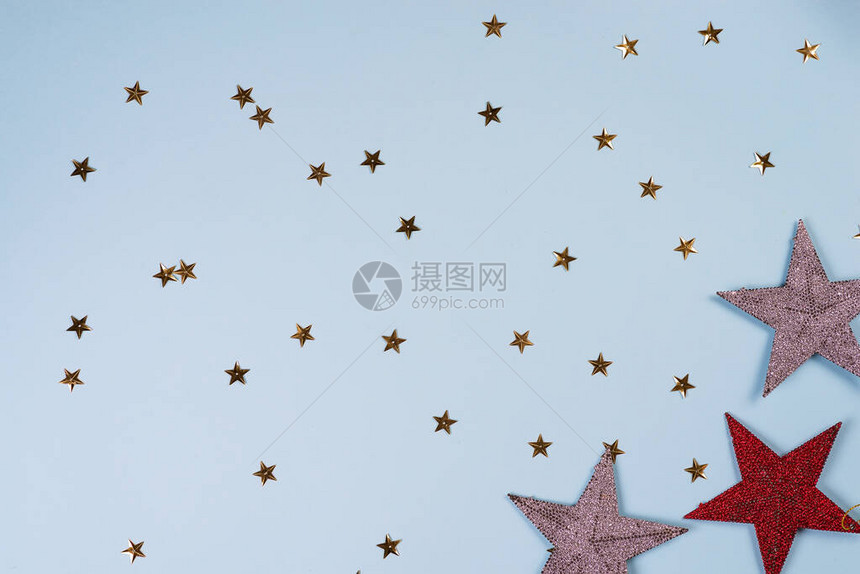 圣诞节模式由金银和红星制成图片