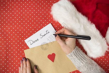 女手写信给圣诞老人信封圣诞帽图片