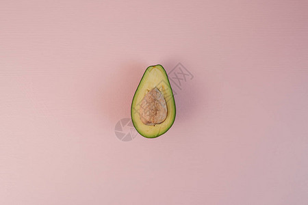 Avocado梨子在粉色背图片