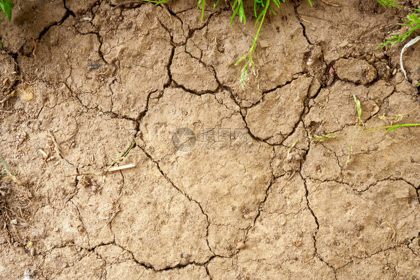 干旱和没有降雨的概念全球暖化破裂的背景破裂的干燥土壤地面图片