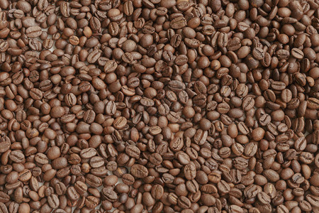 烤咖啡豆全框架光照咖啡豆作背景图片