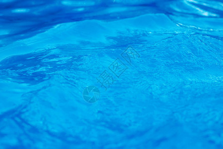 游泳池蓝色的水有纹理背景的图片