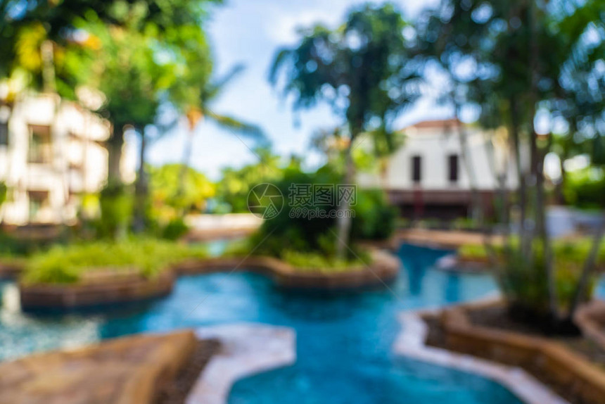 酒店度假村的抽象模糊和散焦美丽室外游泳池图片