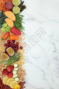 素食健康食品背景与富含蛋白质维生素矿物质抗氧化剂花青素纤维欧米茄3和智能碳水化合物的食物接壤合乎道德的饮食概念平躺在图片