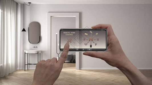 数字智能手机平板电脑上的远程家庭控制系统带有应用程序图标的设备带石膏墙和镶木地板的浴室背景图片
