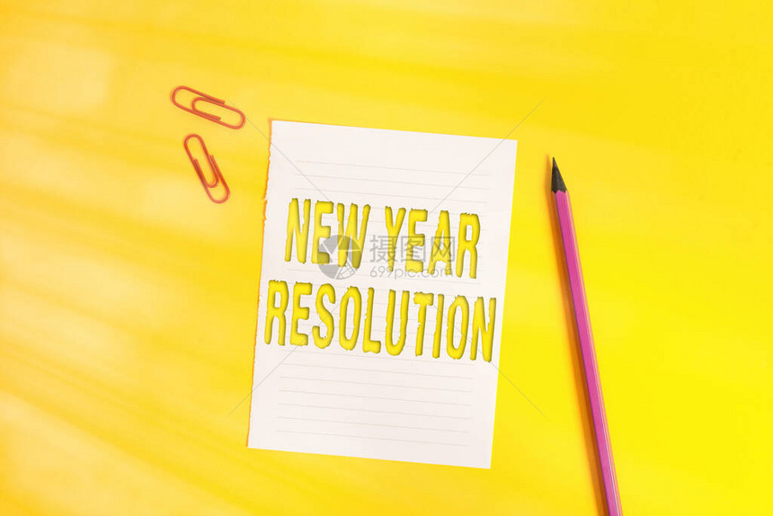 显示新年决心的概念手写概念意义列表目标和变化与确定桌上有复制图片