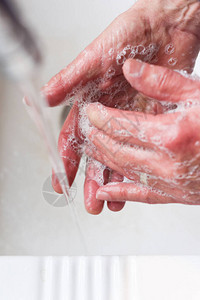 洗手用肥皂洗手防止细菌传播图片