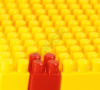 红玩具砖概念领头战略背景黄色的标志图片