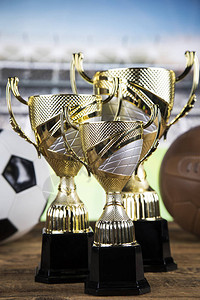 奖杯和运动球背景背景图片