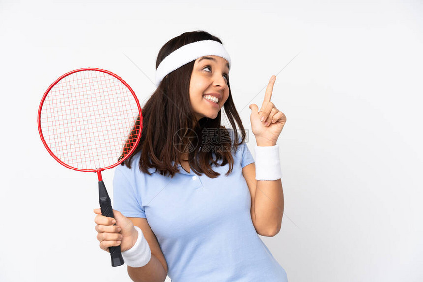 年轻的羽毛球女运动员身处孤立的白色背景用食指图片
