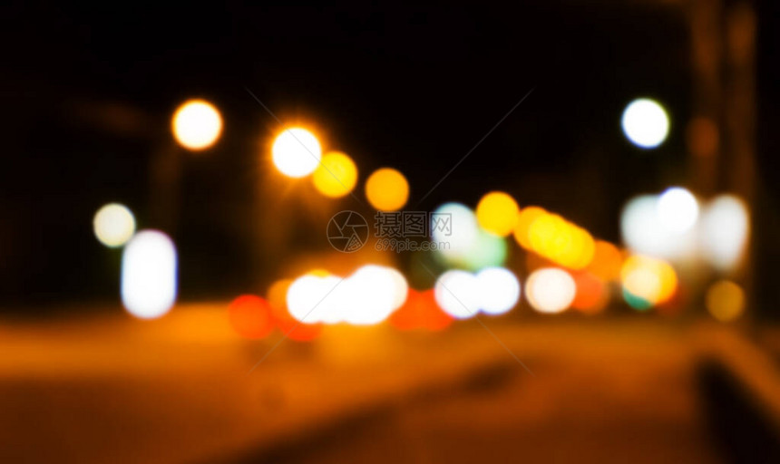 Bokeh点燃了城市纹理的夜间街道反向将模糊的灯光城市抽象图片