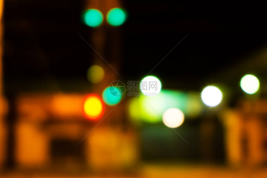 Bokeh点燃了城市纹理的夜间街道反向将模糊的灯光城市抽象图片