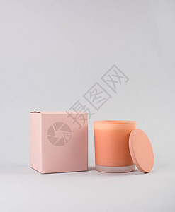 橙色玻璃蜡烛盖子和盒子工作室用复制图片