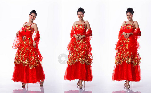 亚洲小姐选美大赛红层裙装演播室照明白色背景全长图片