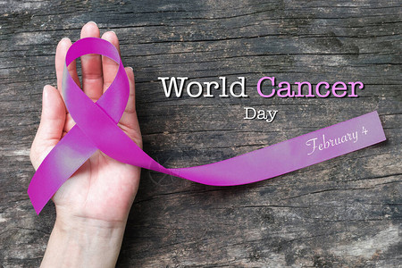 用紫色丝带来提高人们对于各种肿瘤的认识图片