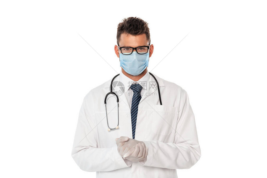 医生戴医疗面具白大衣和听诊器看白色图片