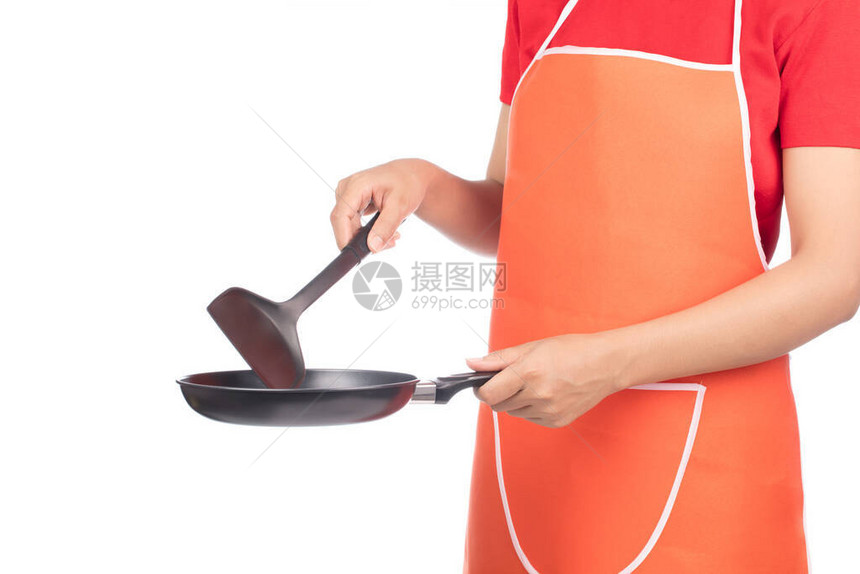 厨师拿着厨具在白色背景下被隔离图片