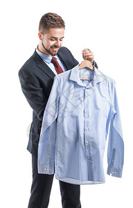现代干洗的男工人衣服穿白背景图片