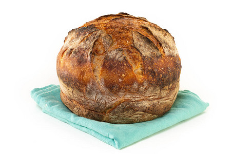 一个自制的烤面包圆形工匠白瓜面包图片