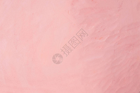 粉红色的背景墙体水泥质地混凝土的笔触图片